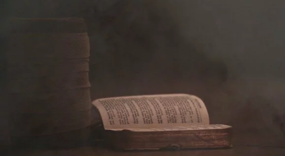 Video screenshot of Bible and bandage in WW1 theatre trailer