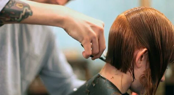 Hairdresser cutting Hair at Blue Tit